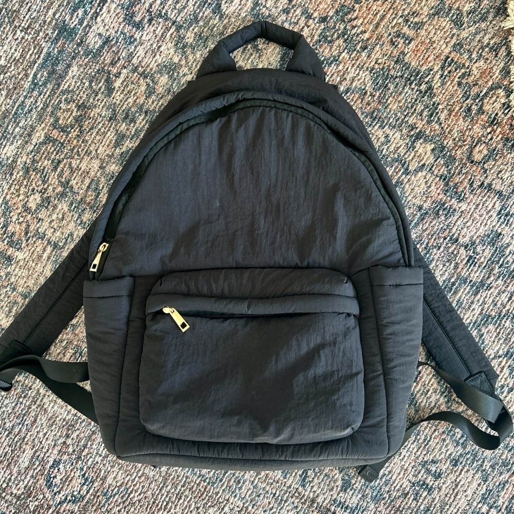 A new day “puff dome” backpack